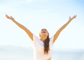 Woman smiling arms raised up to blue sky, celebrating freedom. Positive human emotions, face expression feeling life perception success, peace of mind concept. Free Happy girl on beach enjoying nature-3